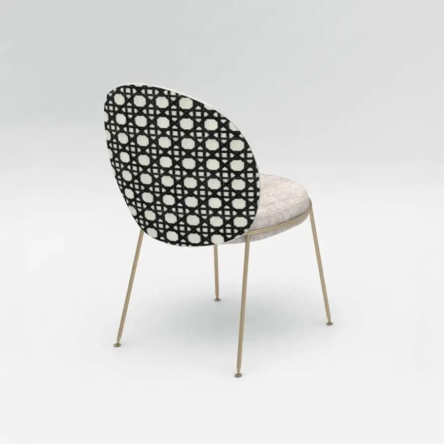 Distinguished Sicis Amaretto chair with geometric black and off-white textile upholstery and gleaming brass-toned metal frame