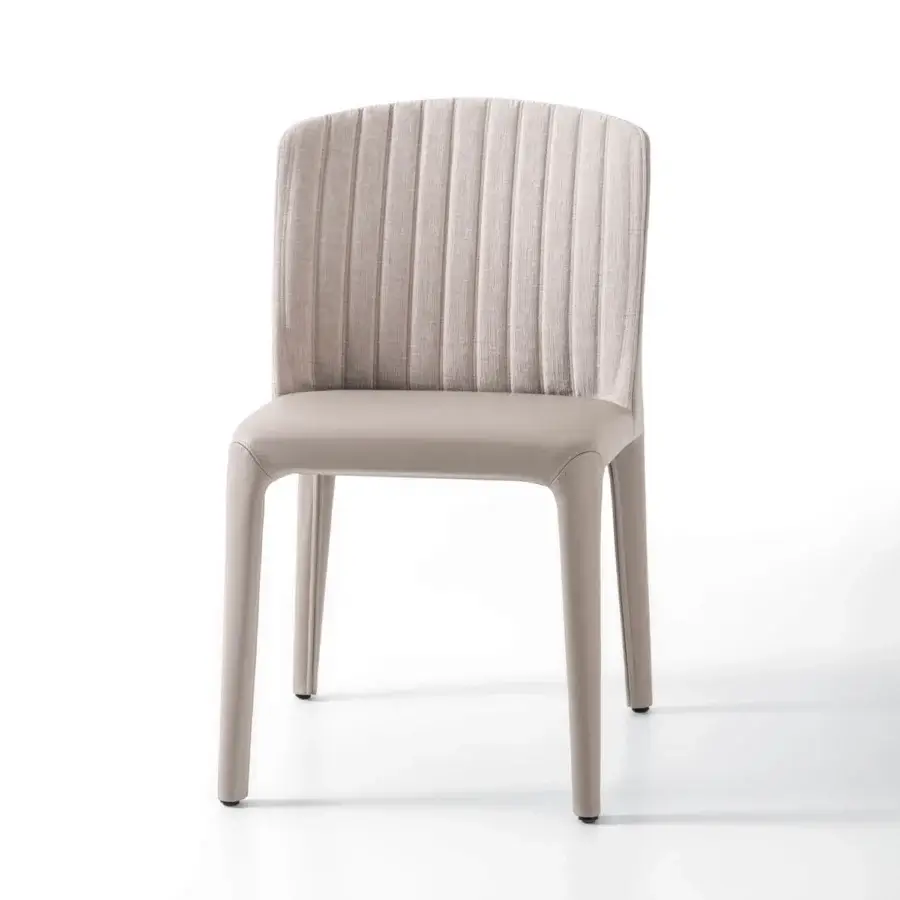 Elegant Giorgetti Bicolette chair upholstered in neutral beige fabric and leather with vertical stitching