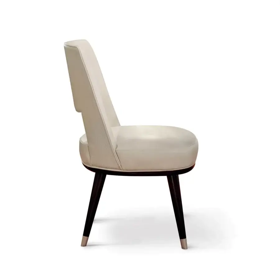 Superior Sicis Liam chair built with solid wood, plywood and textured off-white precious fabric with lacquered legs