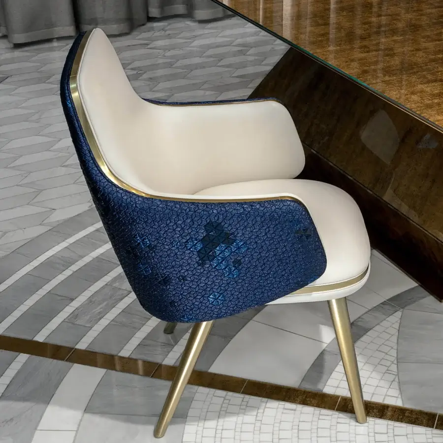 Distinguished Sicis Monrò armchair built with solid wood and plywood, upholstered in deep blue textile with a smooth off-white backrest and lacquered finish