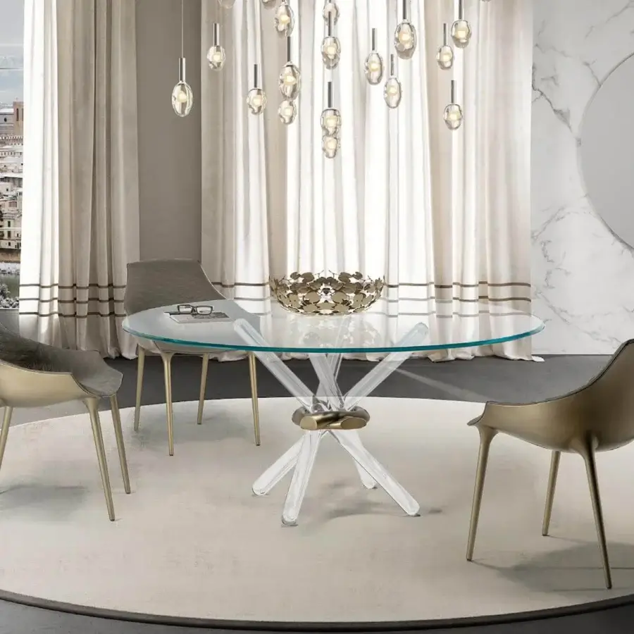 Exclusive Reflex Milady chair crafted in polypropylene with a padded leather seat and lustrous Venezia brass finish