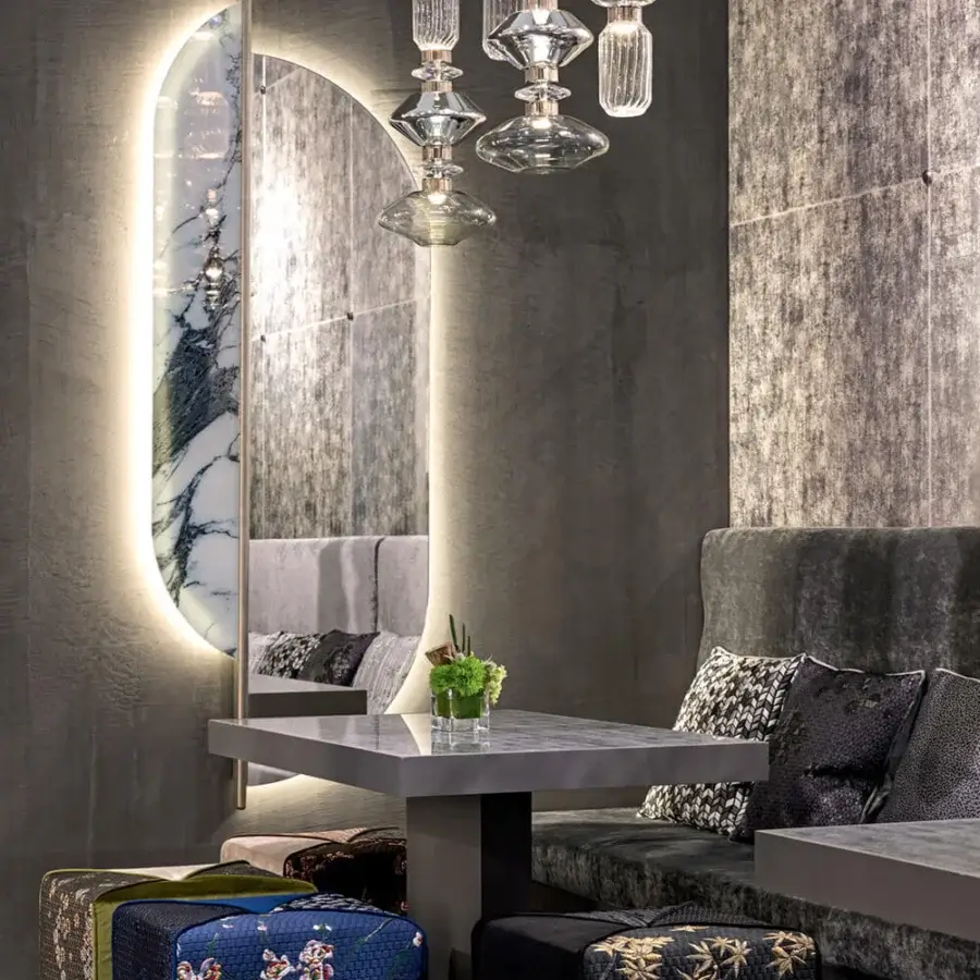 Lavish Sicis Chamaleon square ottoman upholstered in floral fabric with wood and plywood frame construction