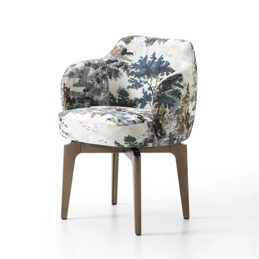 Distinguished Giorgetti Elisa armchair in detailed landscape textile with walnut Canaletto swivel base and satin sheen