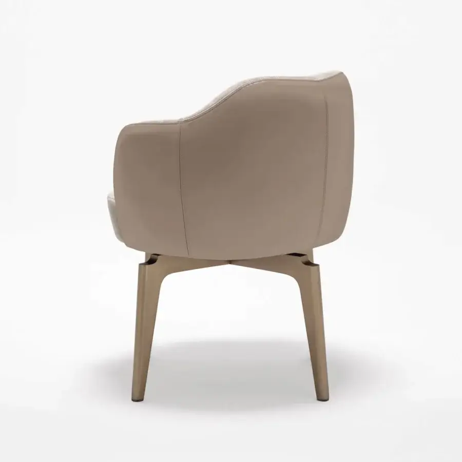 Elegant Giorgetti Elisa armchair in neutral beige leather with satin bronze swivel base crafted in Italy