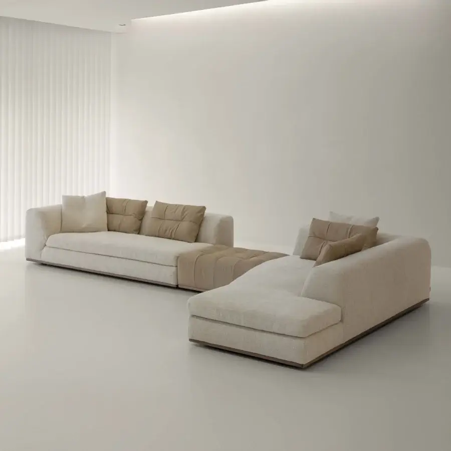 Distinguished Cierre1972 Montgomery sectional in textured neutral beige textile with smooth, leather-like accents and quilted modules