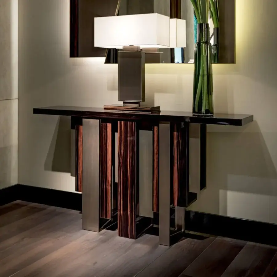 Superior Sicis Totem console crafted with dark wood and metallic supports exhibiting a polished finish
