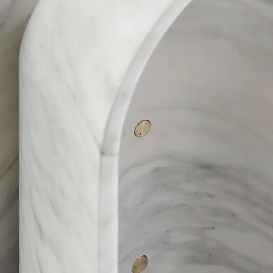 Distinguished Acerbis Le Cupole table crafted with polished marble base and matte polyester finished marble top with brass inserts