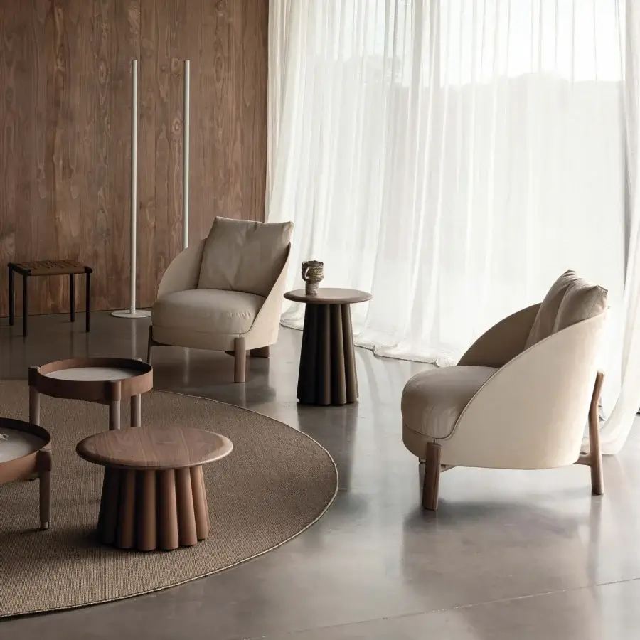 Distinguished Cierre1972 Catarina lounge chair with muted beige textile and solid walnut frame