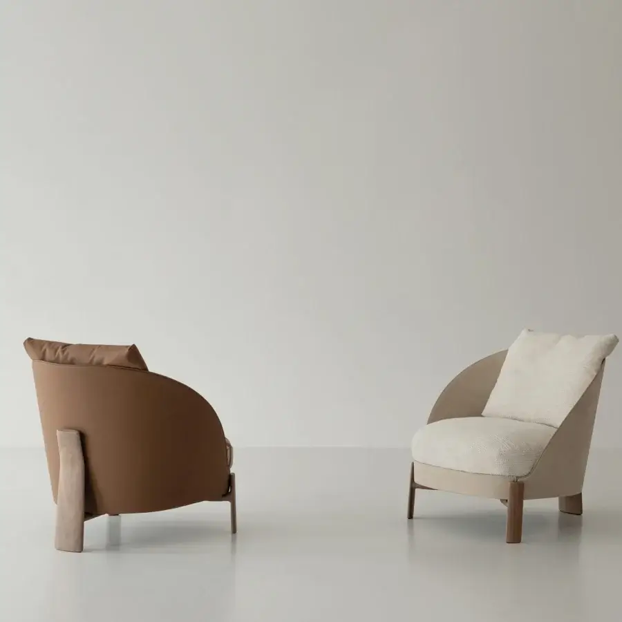 Elegant Cierre1972 Catarina lounge chair in light beige woven textile with a satin-finish solid walnut frame
