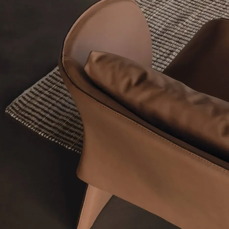 Superior Cierre1972 Knight lounge chair in smooth brown leather with organically curved form and low silhouette