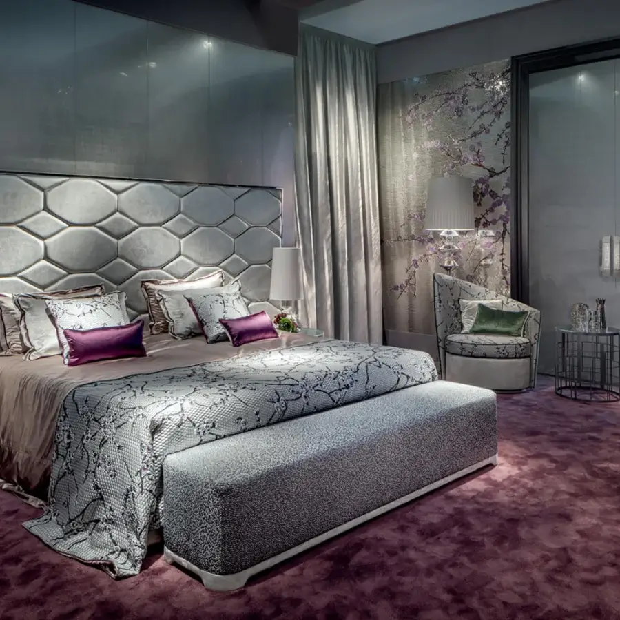 Exceptional Sicis Oyster Bed boasts a geometrically faceted headboard upholstered in muted gray textile with coated lacquer trim