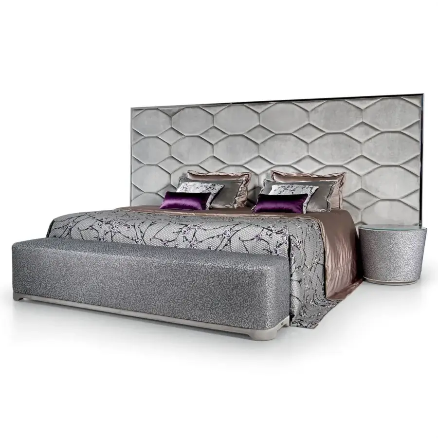 Lavish Sicis Oyster Bed boasts a geometric headboard with textured gray textile upholstery and smooth coated lacquer