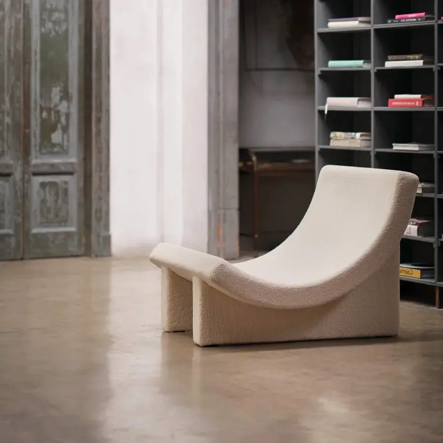 Distinguished Acerbis Trench lounge chair in neutral beige textile with fluid curves and a matte finish