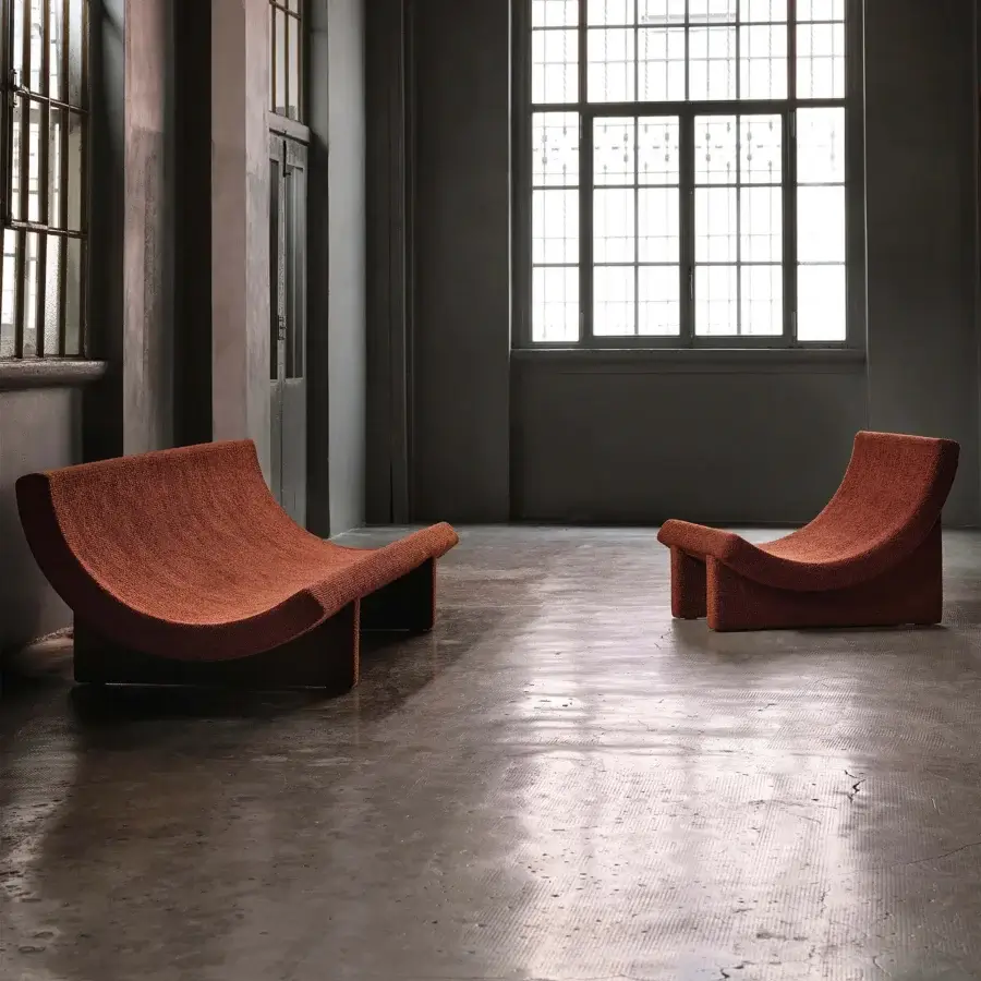 Distinguished Acerbis Trench lounge chair in muted reddish-brown textile with a matte finish and impeccably integrated armrests