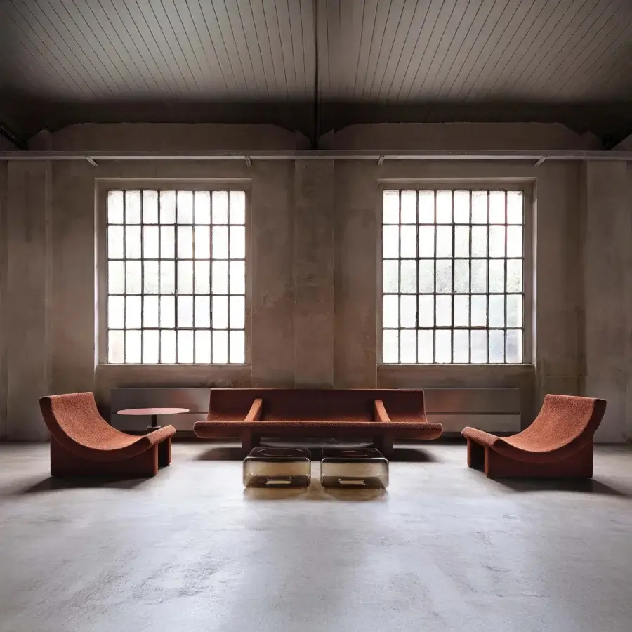 Lavish Acerbis Trench lounge chair in reddish-brown textured textile with a sculpted, cocoon-like silhouette crafted in Italy