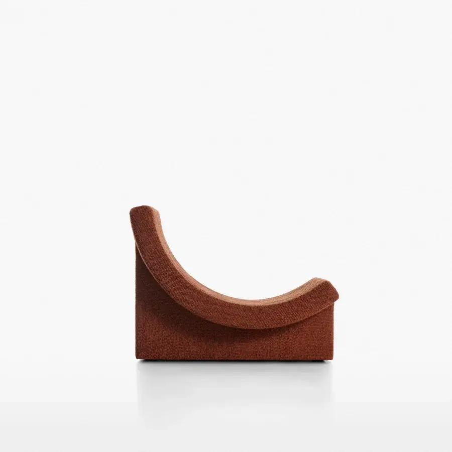 Superior Acerbis Trench lounge chair in terracotta textured textile with sweeping curves and integrated armrests crafted in Italy