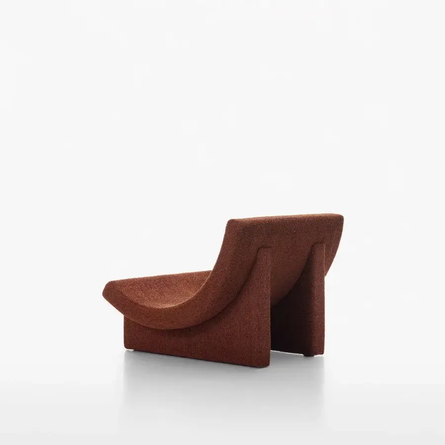 Exceptional Acerbis Trench lounge chair in reddish-brown textured textile with fluid curves and integrated armrests crafted in Italy