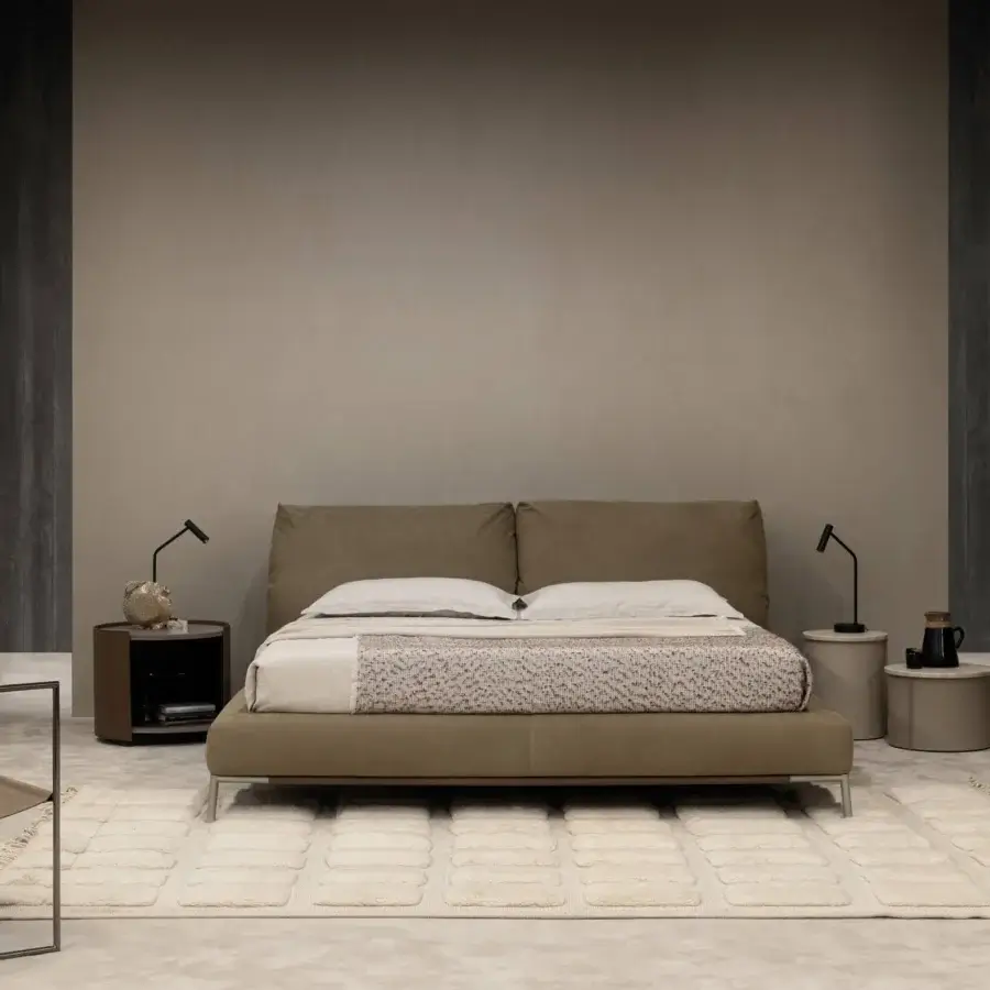 Harmonious Cierre1972 Chapeau Bed built with muted taupe textile and a reclining headboard for personalized comfort