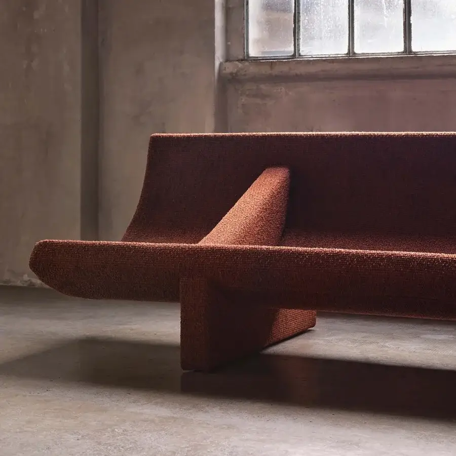Avant-garde Acerbis Trench sofa with a muted reddish-brown textured textile and seemingly suspended structure