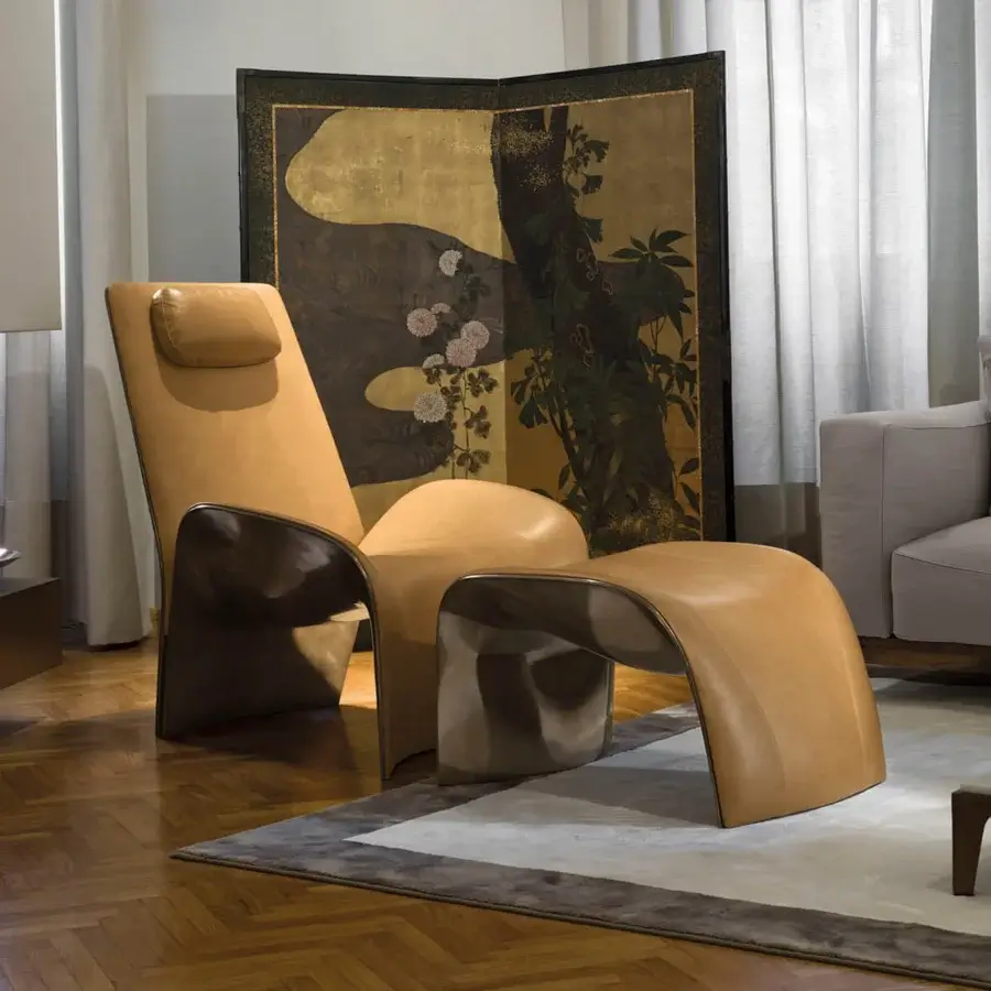 Superior Giorgetti Eva lounge chair crafted with compact rigid polyurethane and smooth saddle leather in a satin finish