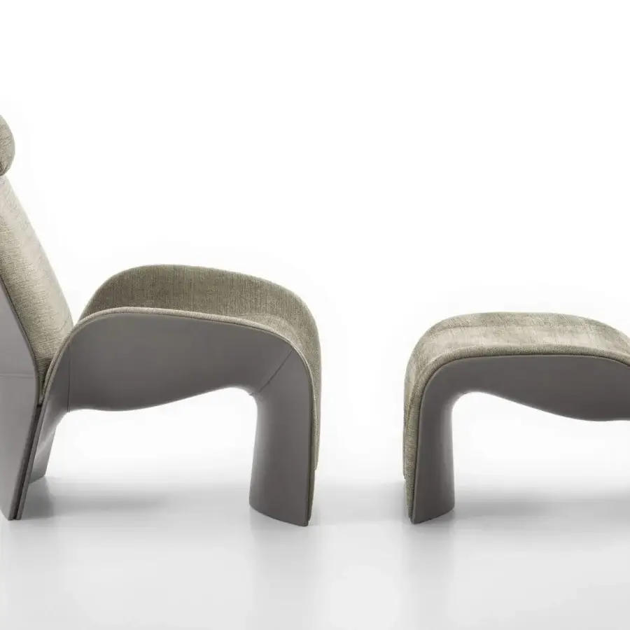 Superior Giorgetti Eva lounge chair with warm gray textile upholstery and shiny lacquered structure