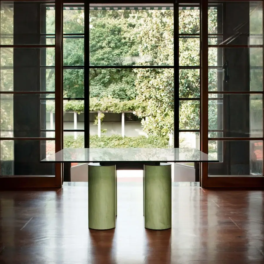 Exceptional Acerbis Serenissimo table with transparent tempered glass tabletop and substantial muted green encaustic sandblasted blown glass base
