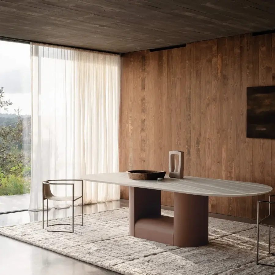 Distinguished Cierre1972 Samoa table crafted in Italy with a composite stone tabletop and leather base exhibiting a minimalist aesthetic