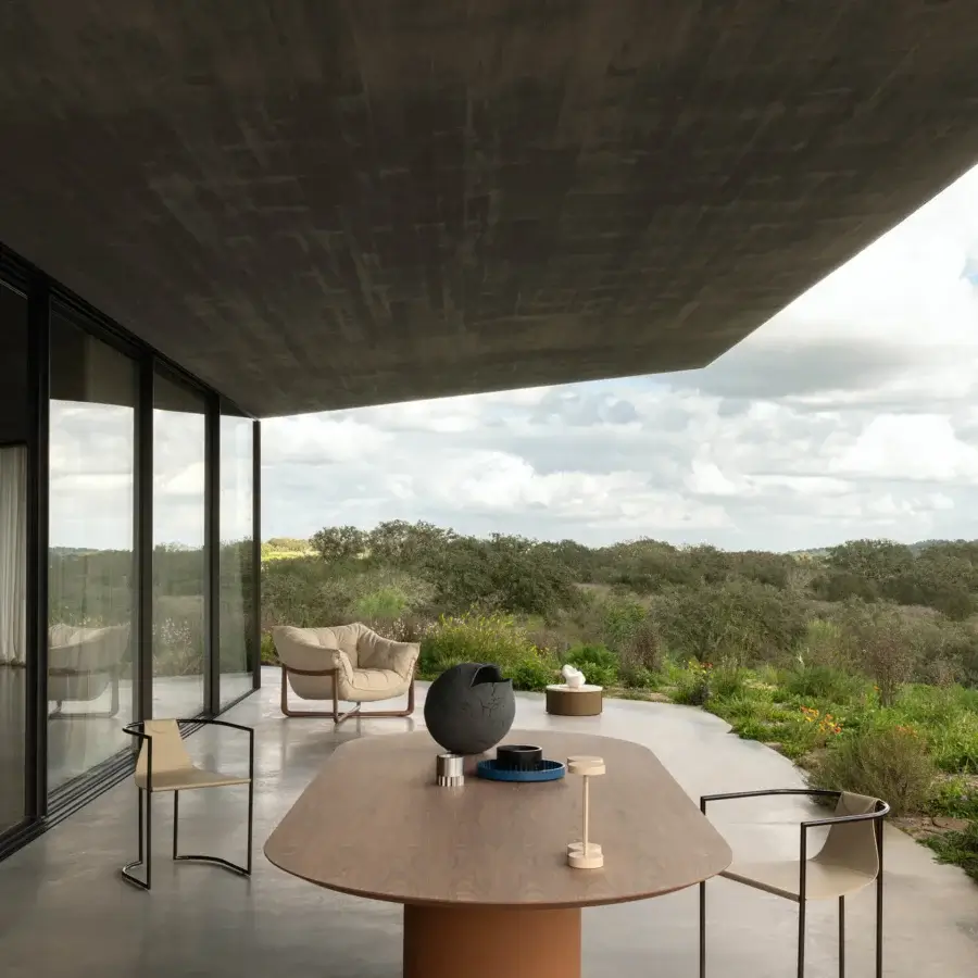 Exceptional Cierre1972 Samoa table crafted in Italy with solid wood tabletop and leather base exhibiting a satin finish