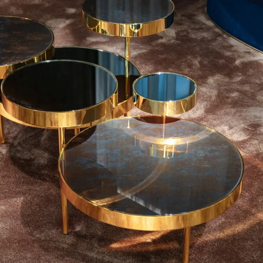 Distinguished Sicis Orbital coffee table with dark reflective Vetrite glass tops and polished golden metal structure