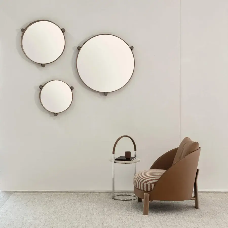 Exceptional Cierre1972 Miro mirror crafted with medium-brown leather and glass, displaying a smooth satin finish