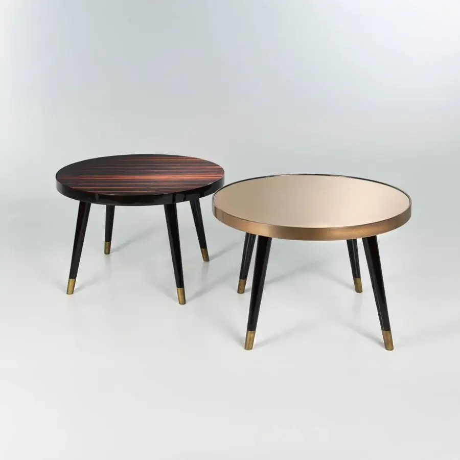 Elegant Sicis Peggy round side & coffee table with ebony tabletop and dark lacquered wood legs built with gold-toned metal accents