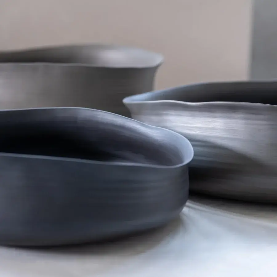 Distinguished Rina Menardi Cenote vessel set handcrafted in dark charcoal gray baked clay with tonal gradients