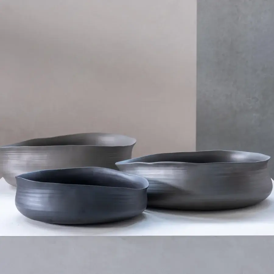 Distinguished Rina Menardi Cenote vessels crafted from baked clay with a subtly textured matte finish