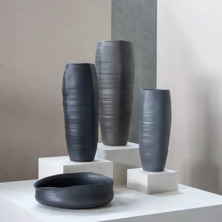 Distinguished Rina Menardi Cenote vessel set crafted in baked clay with undulating silhouettes and matte finish