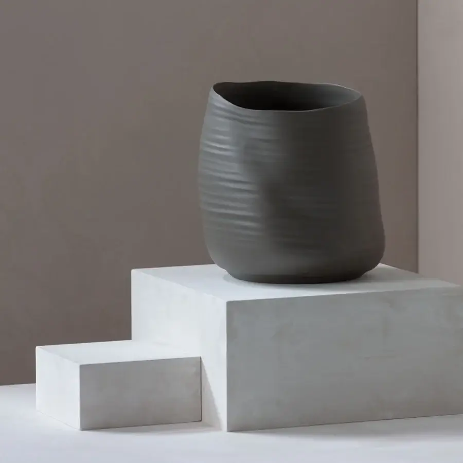 Exclusive Rina Menardi Cenote Alto vessel sculpted from baked clay with a matte textured surface