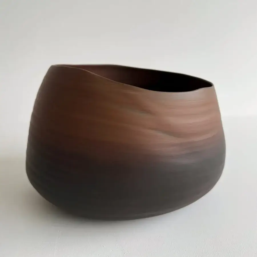 Distinguished Rina Menardi Cenote Alto vessel crafted from baked clay in earthy brown with a smooth matte finish