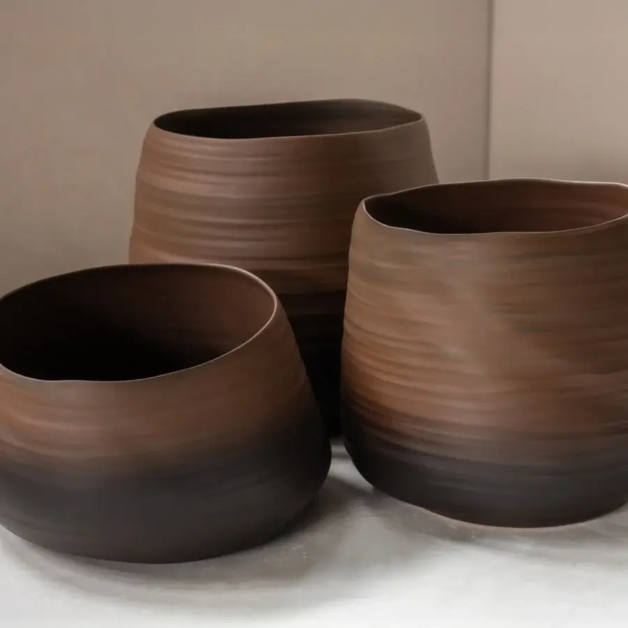 Exceptional Rina Menardi Cenote Alto vessel crafted from baked clay with horizontal striations and a matte finish