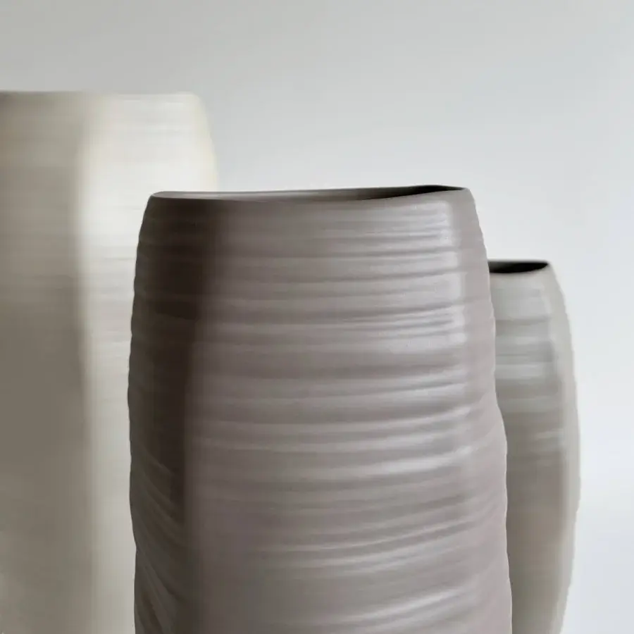 Luxury Rina Menardi Rocce vase sculpted from baked clay with a refined matte finish and subtle horizontal texture