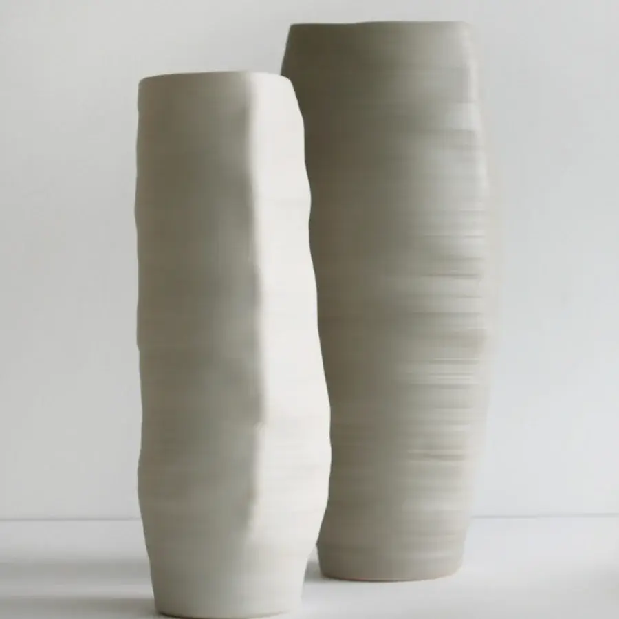 Distinguished Rina Menardi Rocce vase sculpted from baked clay with gently curved profiles and a subtly textured matte finish