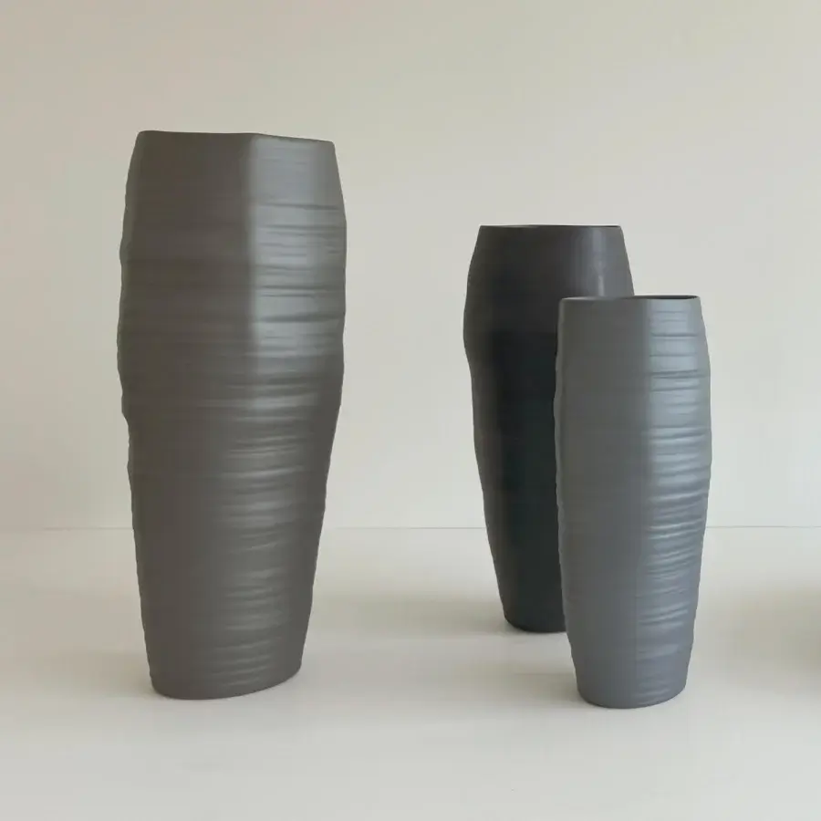 Distinguished Rina Menardi Rocce vase sculpted in baked clay with undulating surfaces and a light-diffusing matte finish