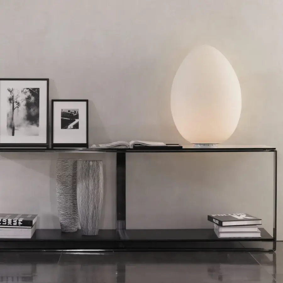 Superior FontanaArte Uovo table lamp crafted in white satin blown glass with a white painted metal base emitting uniform light