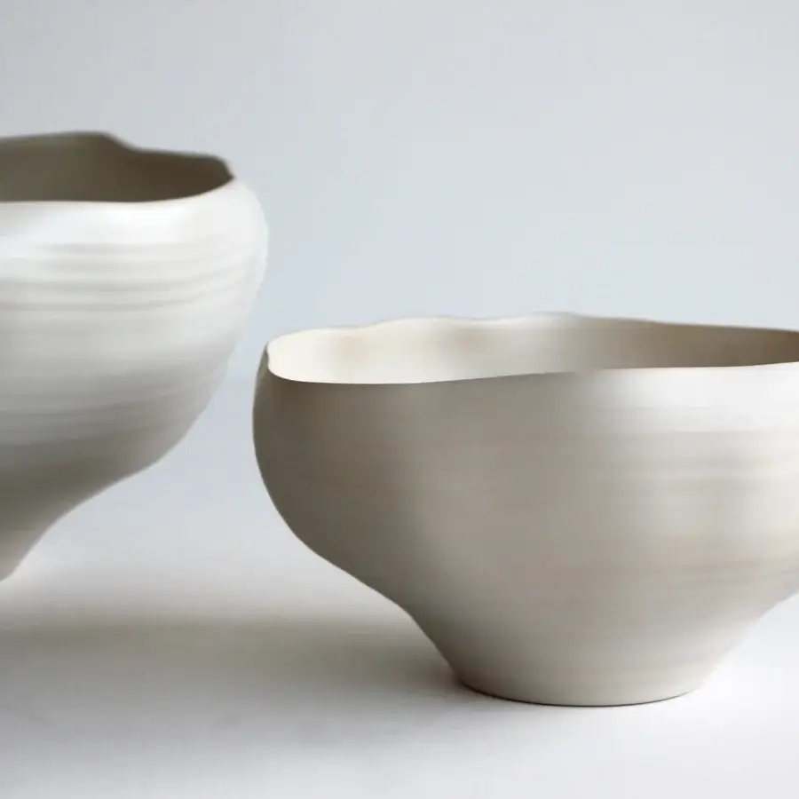 Distinguished Rina Menardi Fonti vessel sculpted from baked clay with organic curves and a matte finish