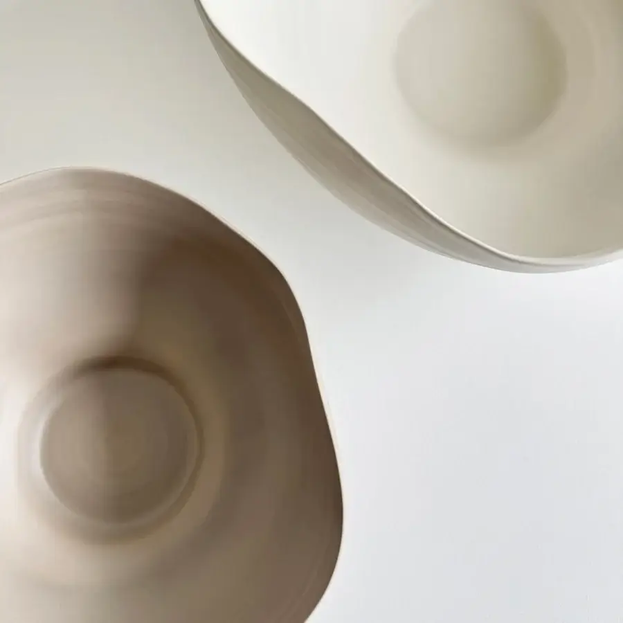 Exceptional Rina Menardi Fonti vessel crafted from baked clay in a pale beige hue with a matte finish