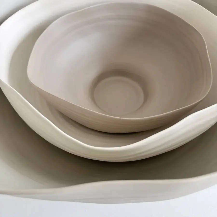 Exclusive Rina Menardi Fonti vessel crafted from baked clay in a warm beige hue with a matte finish