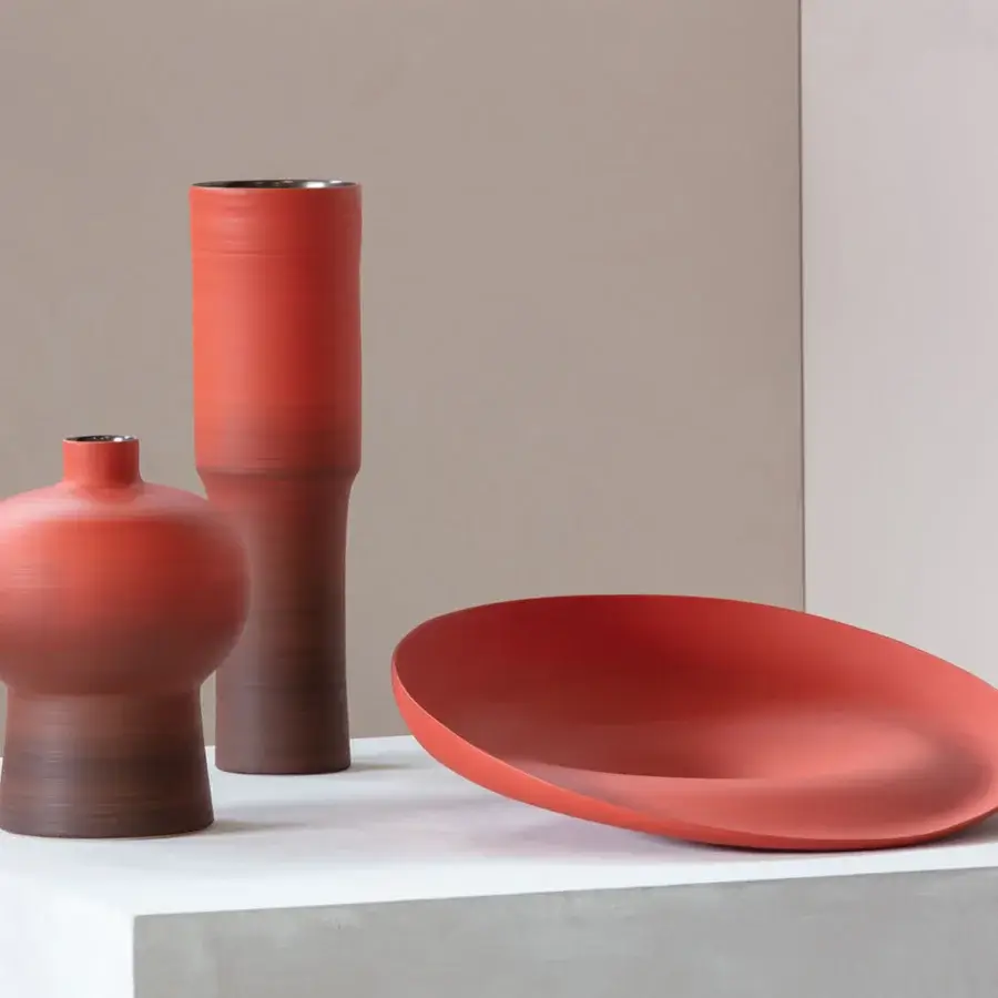 Superior Rina Menardi Trottole centerpiece crafted in baked clay with a muted terracotta tone and matte finish