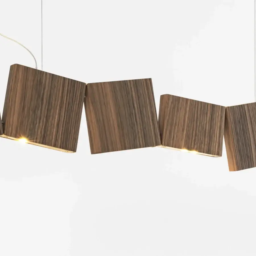 Elegant Terzani Gaia suspension lamp crafted in wood with satin finish emitting a warm yellowish glow