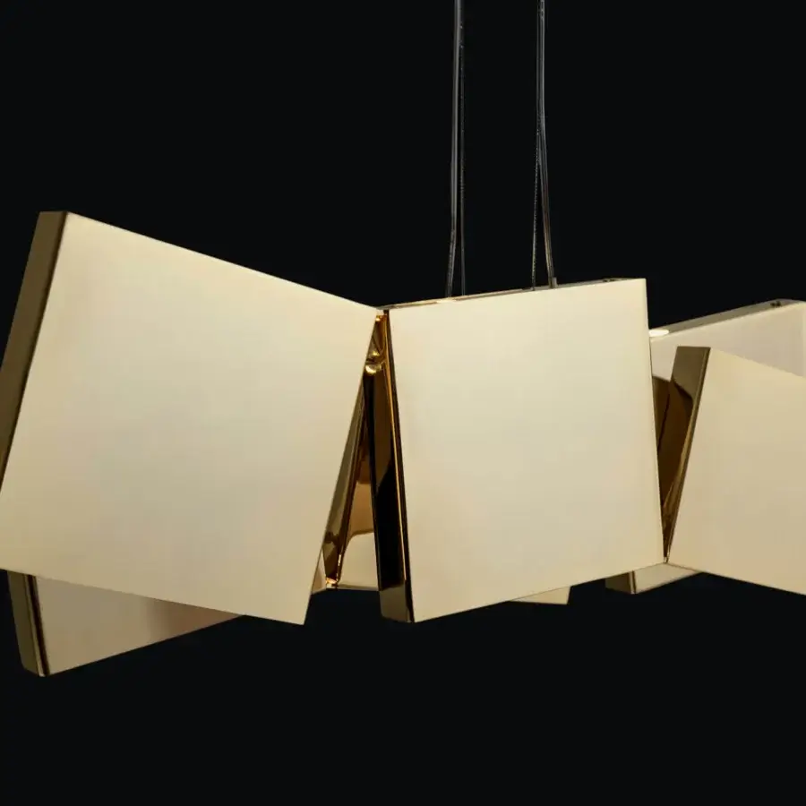 Distinguished Terzani Gaia suspension lamp crafted from polished metal with bright gold finish creating captivating light and shadow interplay