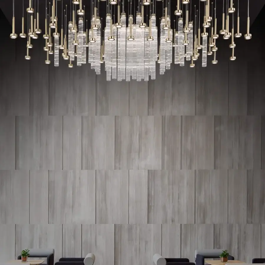 Exceptional Euroluce Astract suspension lamp with warm gold-toned metal framework and translucent borosilicate glass elements