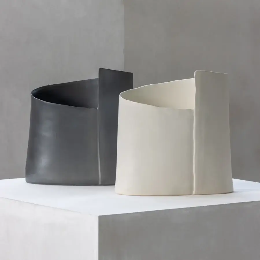 Exceptional Rina Menardi Torri vase crafted from baked clay in a dark gray tone with a smooth matte finish