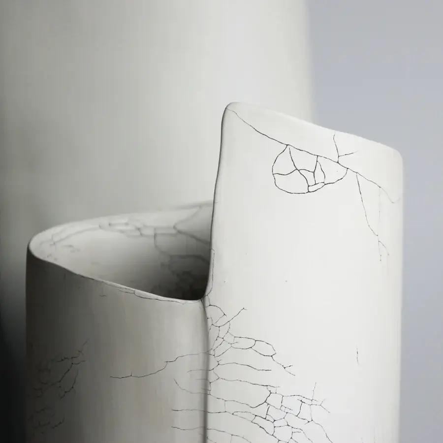 Superior Rina Menardi Torri vase crafted in baked clay with a subtle crackle and off-white matte finish